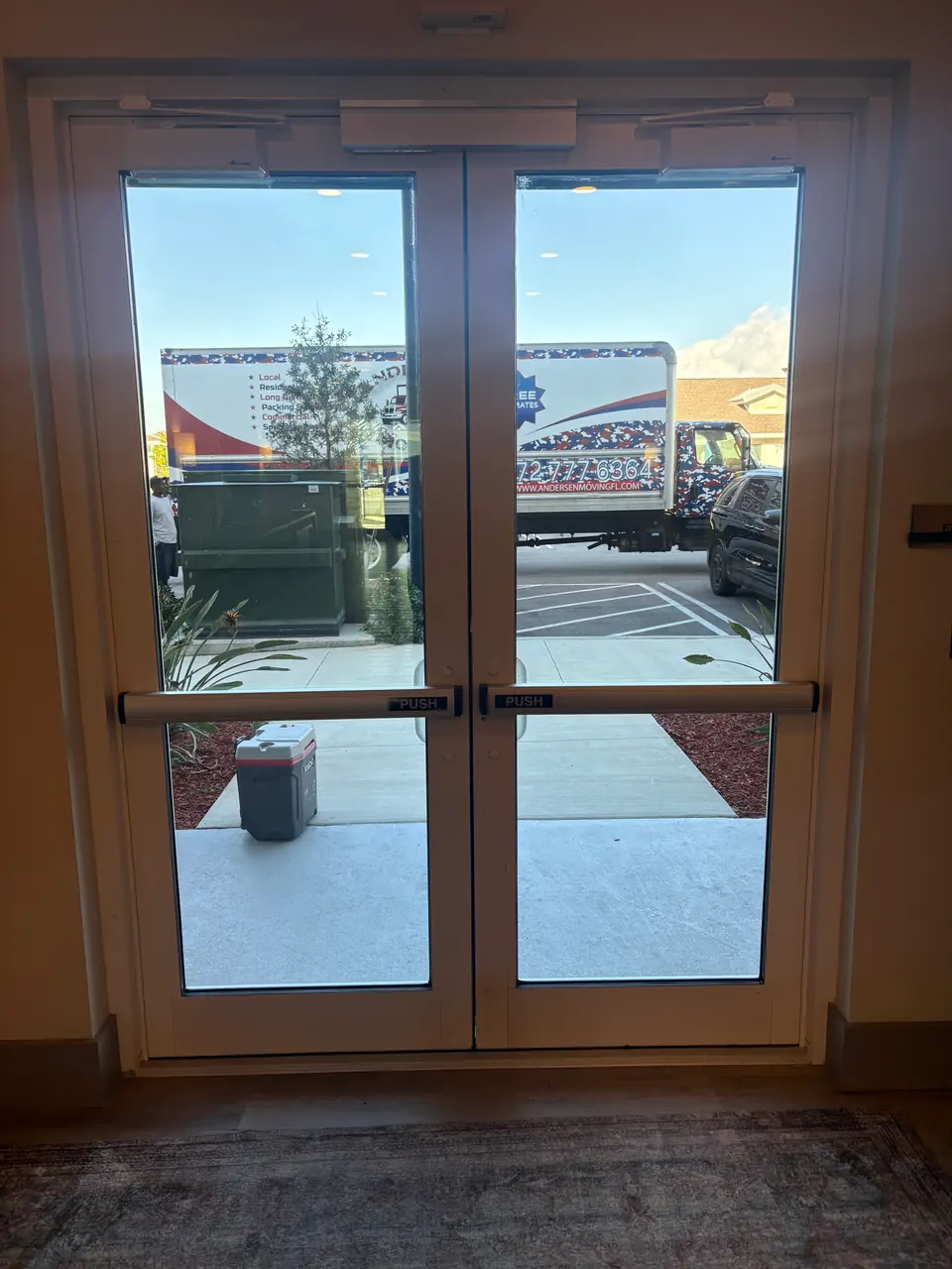 Andersen Moving truck at a Jupiter community entrance